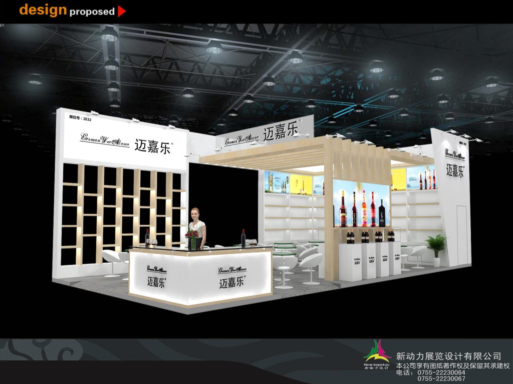 3D render of a sleek, white and wood exhibition booth with a reception desk, bottle displays, and a seating area. A woman stands behind the counter.