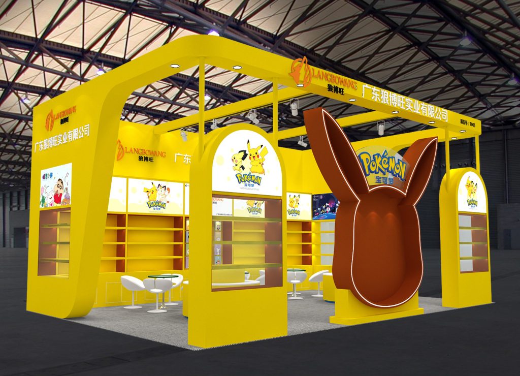 Digital rendering of a bright yellow exhibition booth with empty shelves and an empty large brown ear-shaped display. White chairs and tables are arranged at a different angle.