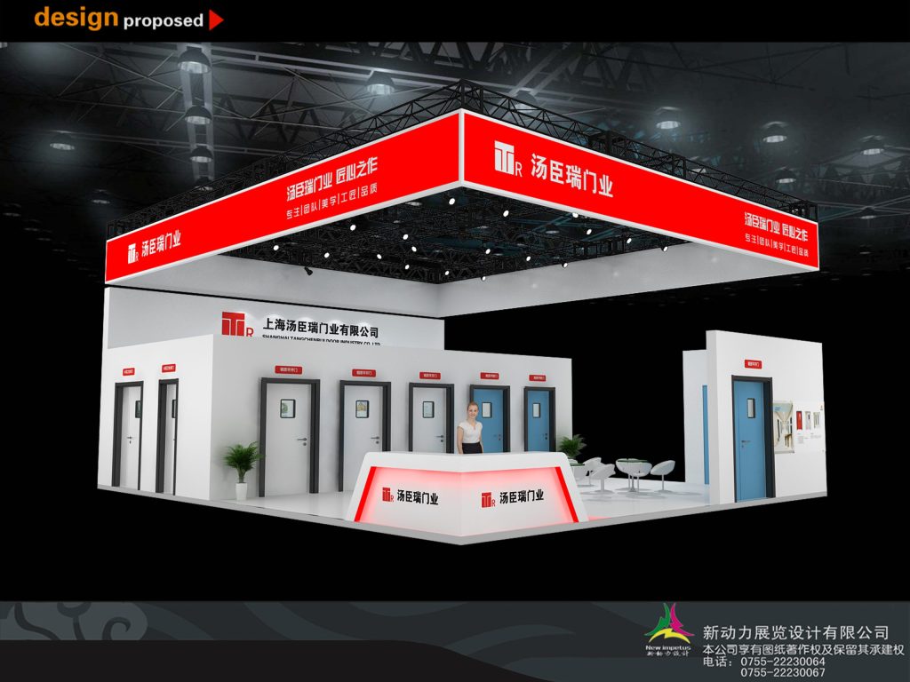 3D render of a white exhibition booth with red overhead signs, displaying various modern doors. A female figure stands at a reception desk, with a seating area nearby.