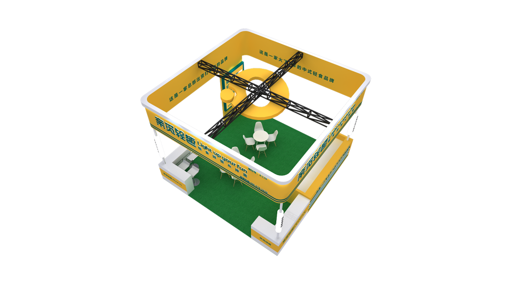 Top-down 3D render of a yellow and green exhibition booth, showing a central counter and a seating area with four chairs on green turf.