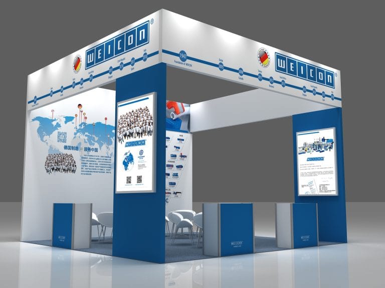 Render of a white and blue exhibition booth with a world map and large group display.