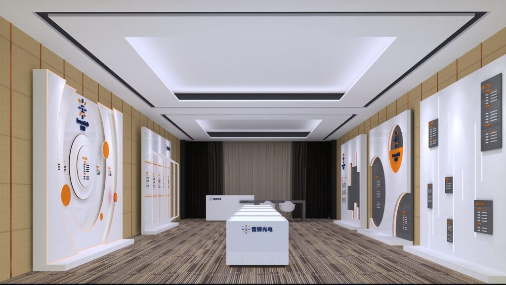 A digital rendering of a sleek exhibit hall with white illuminated display walls, a long central counter, and a striped brown carpet.