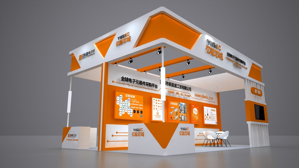 Render of a modern orange and white exhibition booth with multiple display screens, a counter, and small tables with white chairs.