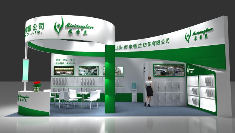 3D render of a green and white exhibition booth featuring hanging white garments, a meeting area, screens, and product displays.