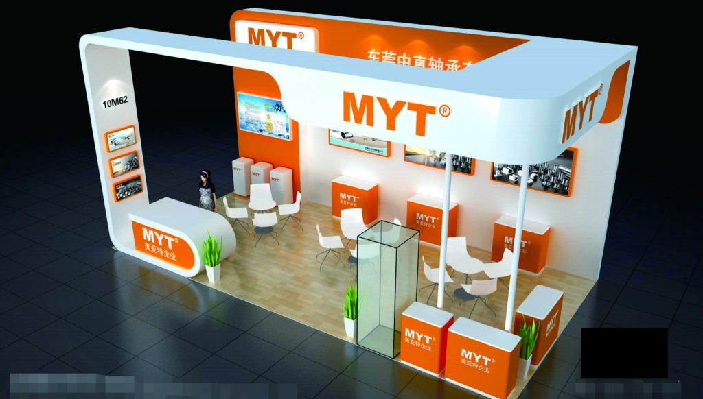 Overhead view of an expansive orange and white exhibition booth with multiple areas.