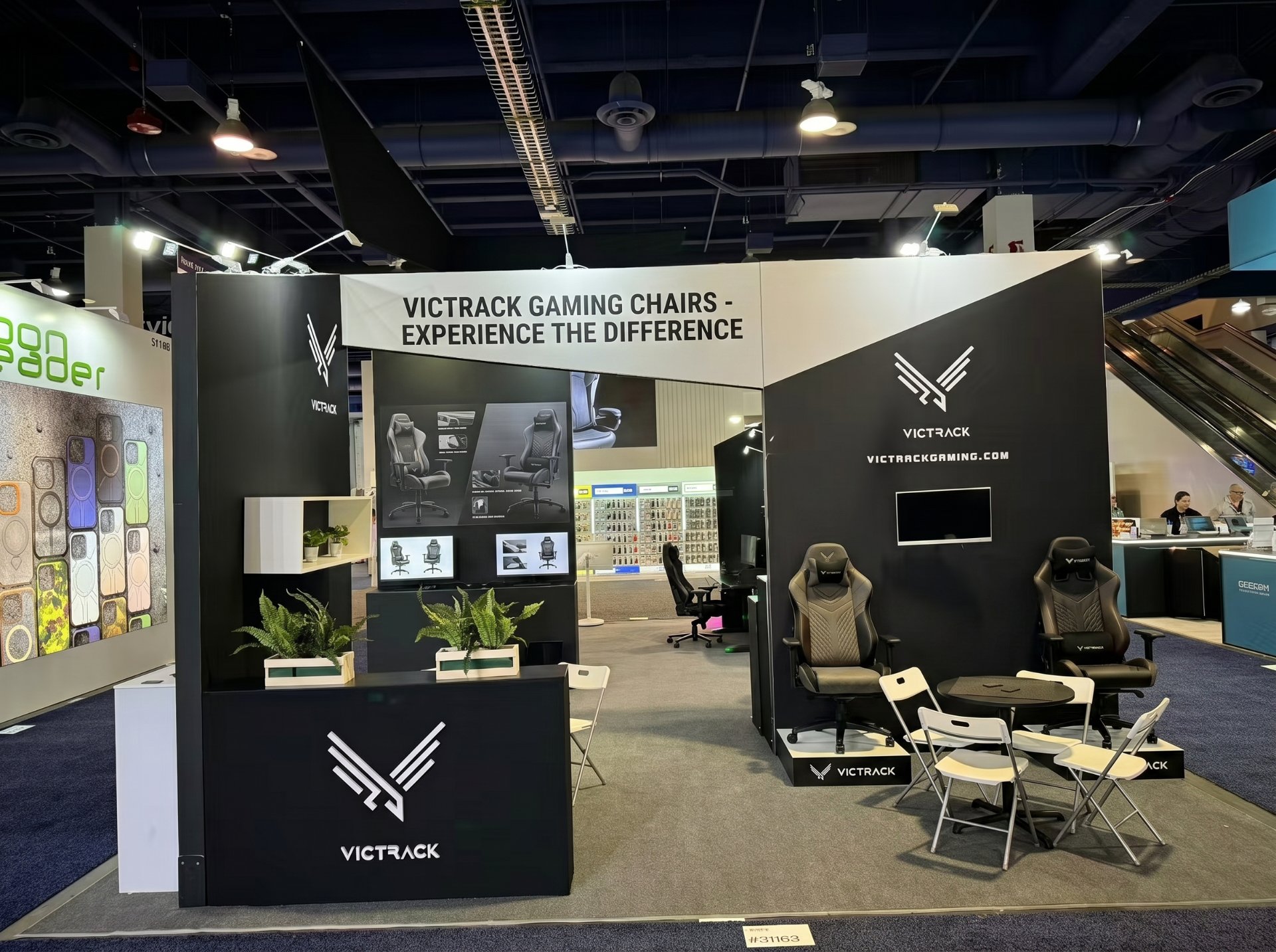 booth lounge and meeting seating area at a consumer tech trade show