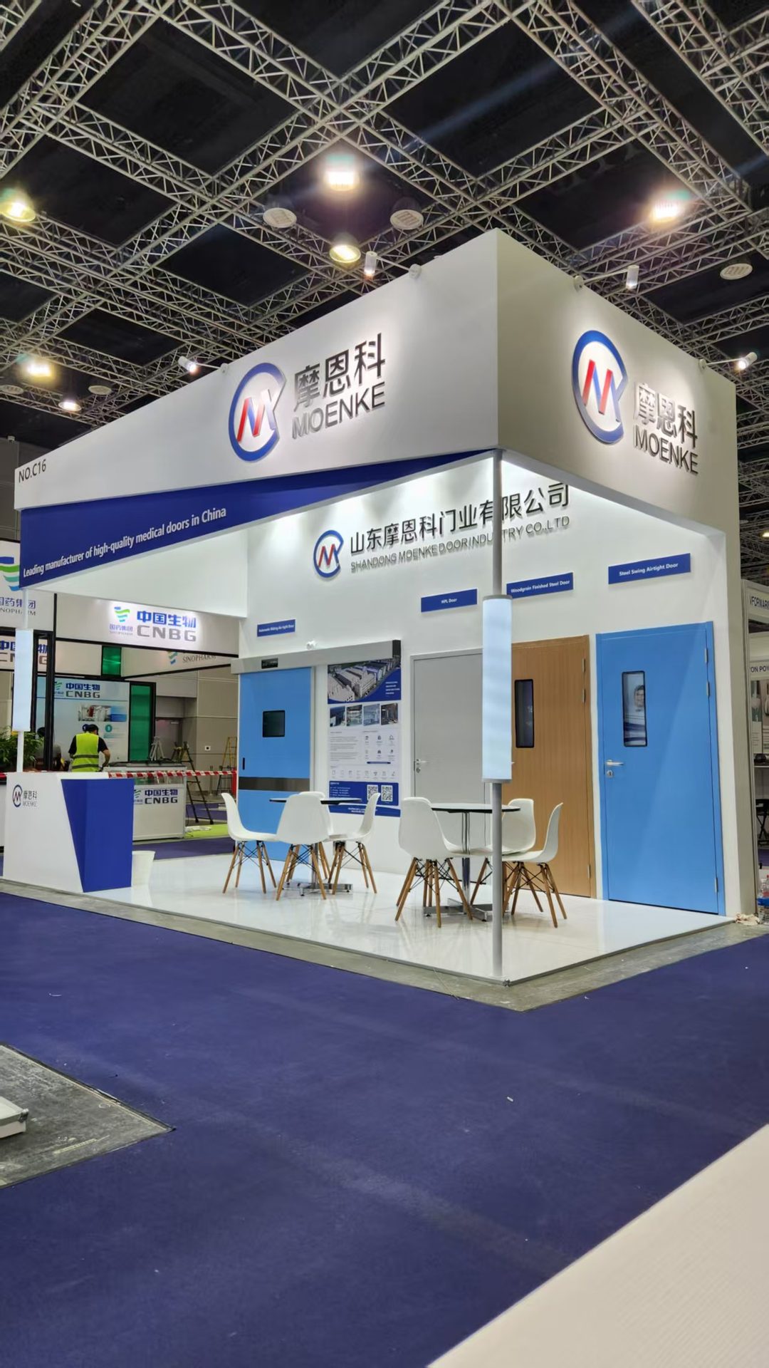 exhibition booth entrance angle with backlit sign at a Malaysian trade show venue
