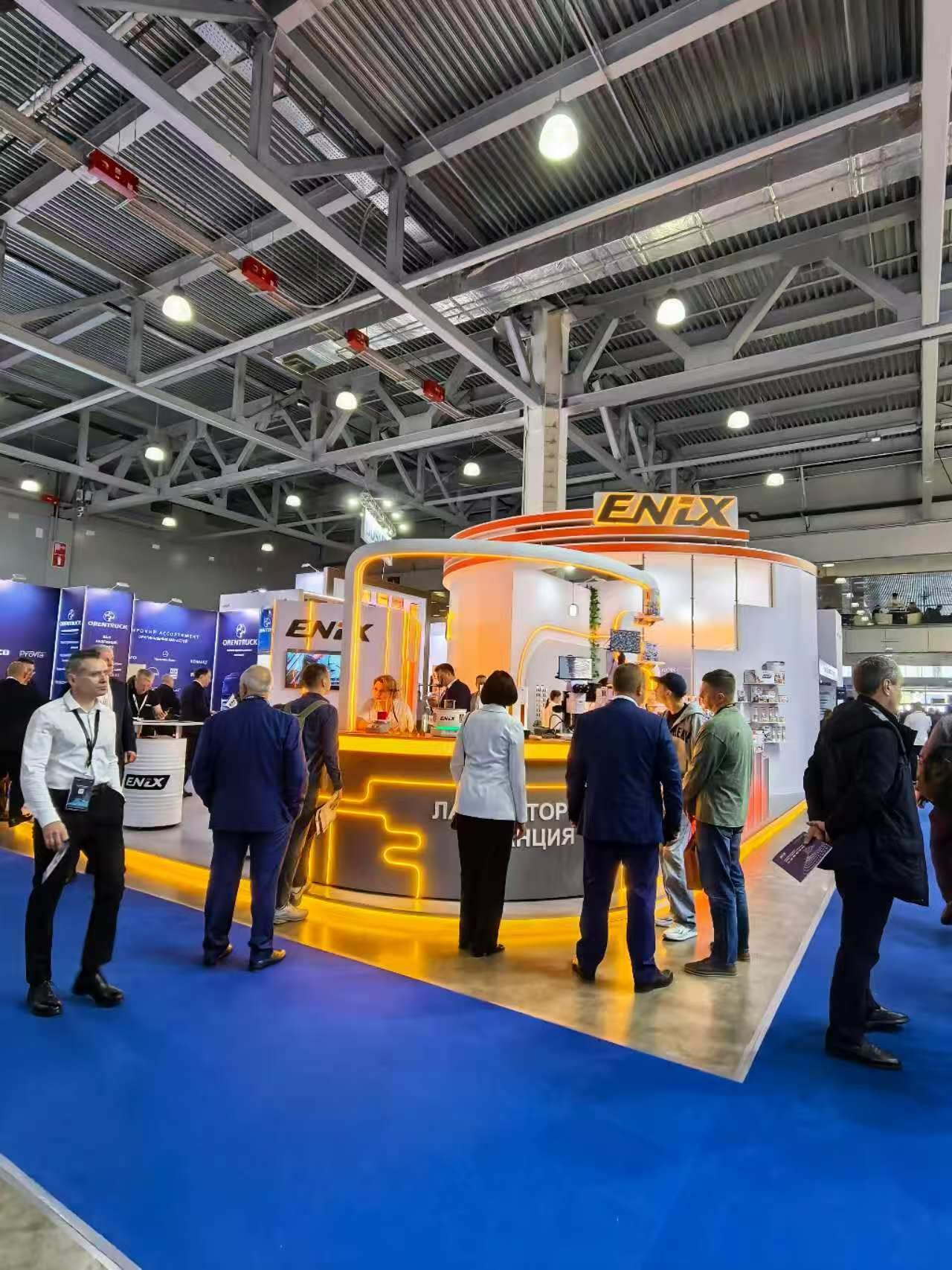 exhibition booth reception counter with visitors at a Moscow trade show