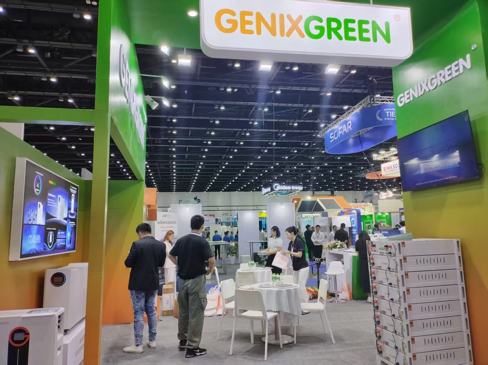 island exhibition stand with hanging sign in a Bangkok exhibition hall
